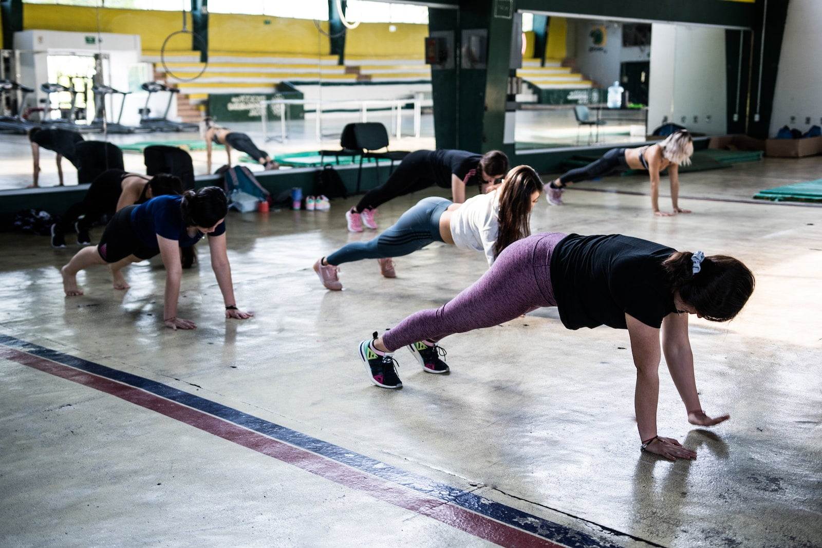 Doing push-up at sports hall