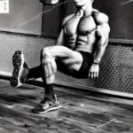 man executing sigle leg wall sit